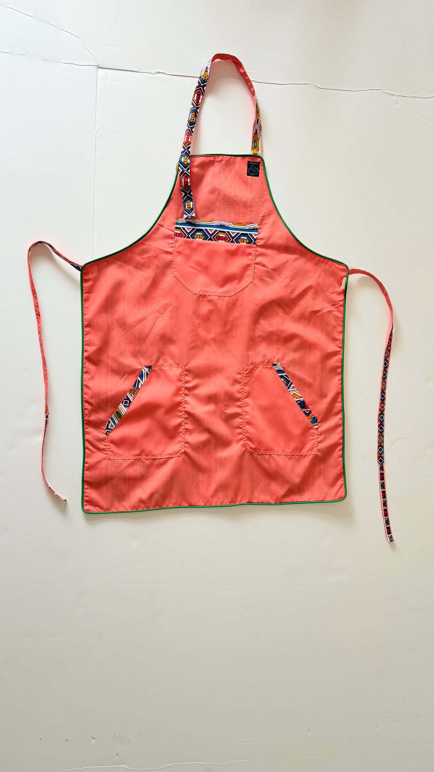 Reversible print fabric apron (Ndebele & Solid Salmon)