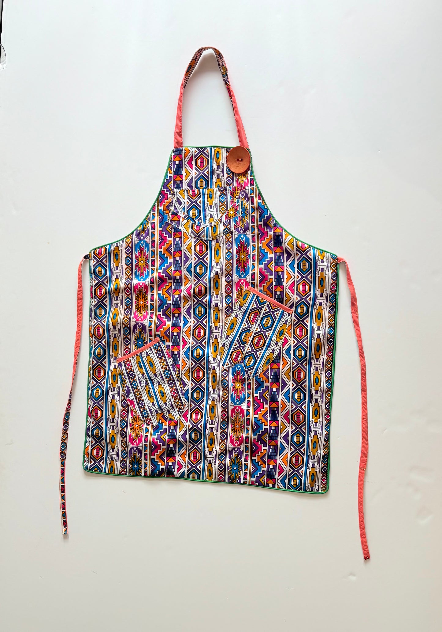 Reversible print fabric apron (Ndebele & Solid Salmon)