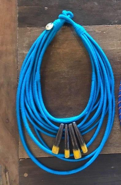 10 ring sky blue and dark stone necklace